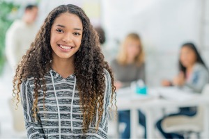 Teenager smiling in camera